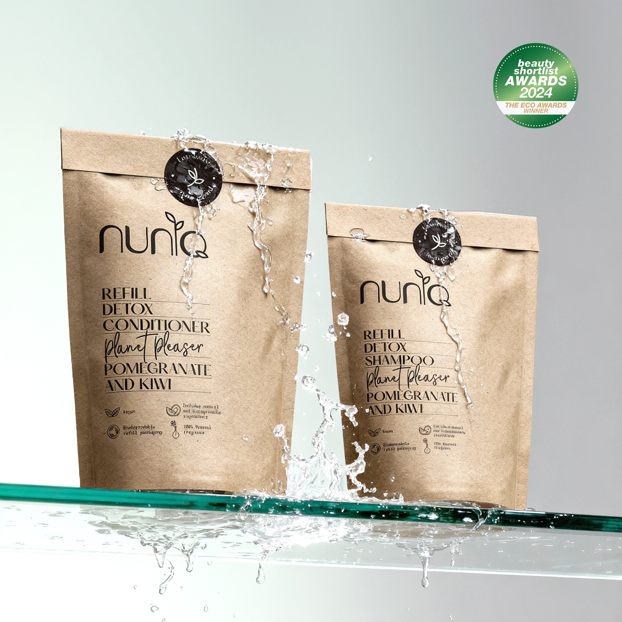 Two brown paper bags labeled &