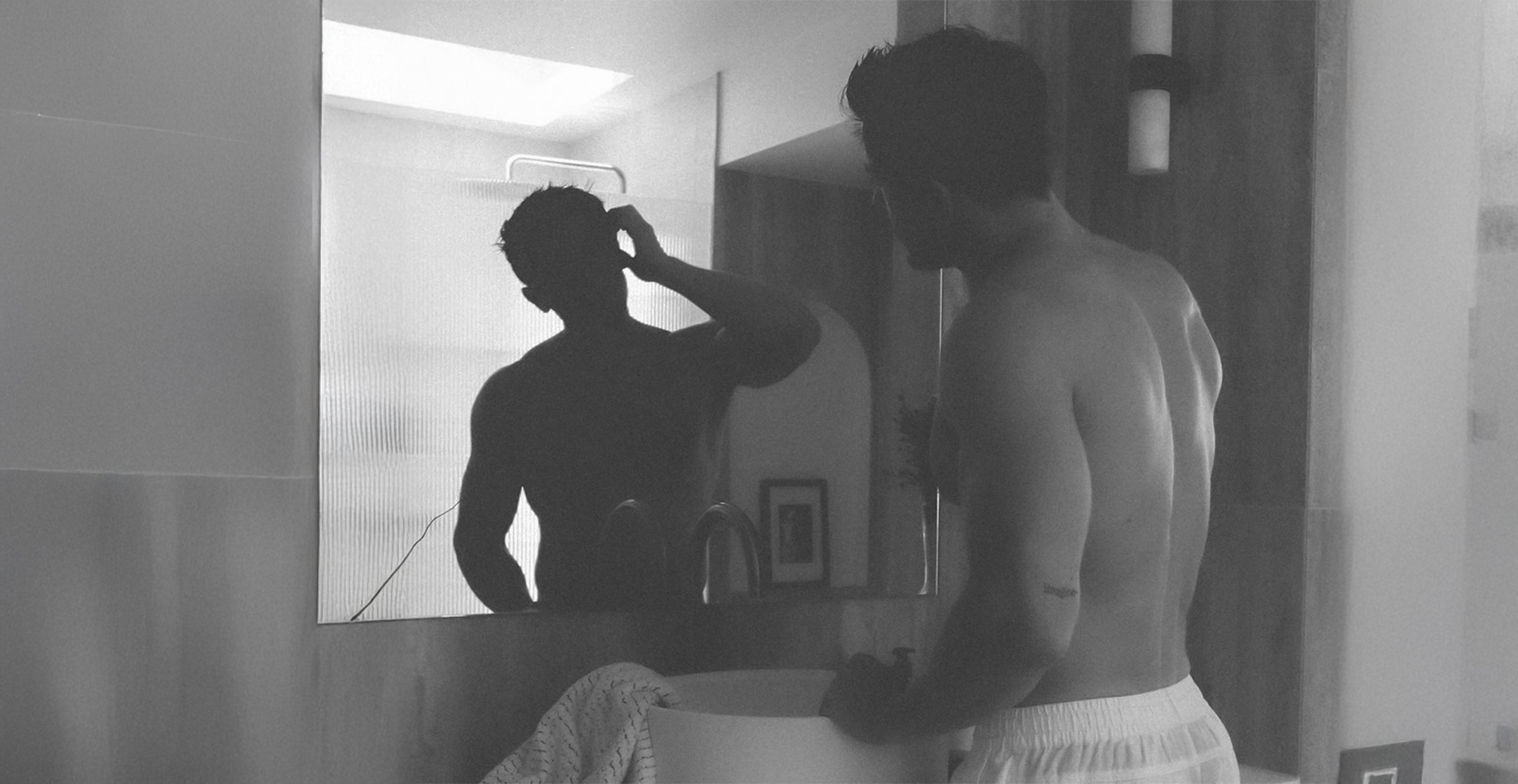 Close-up of scalp and thinning hair illustrating androgenetic alopecia, the most common form of hair loss.