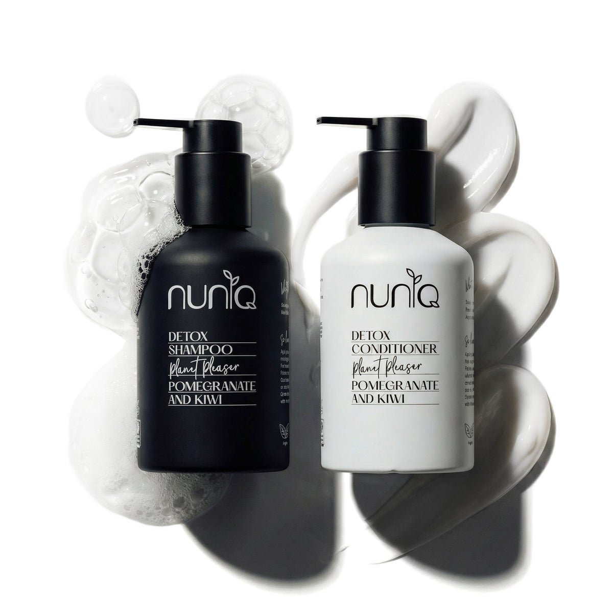 Black and white shampoo and conditioner bottles with &