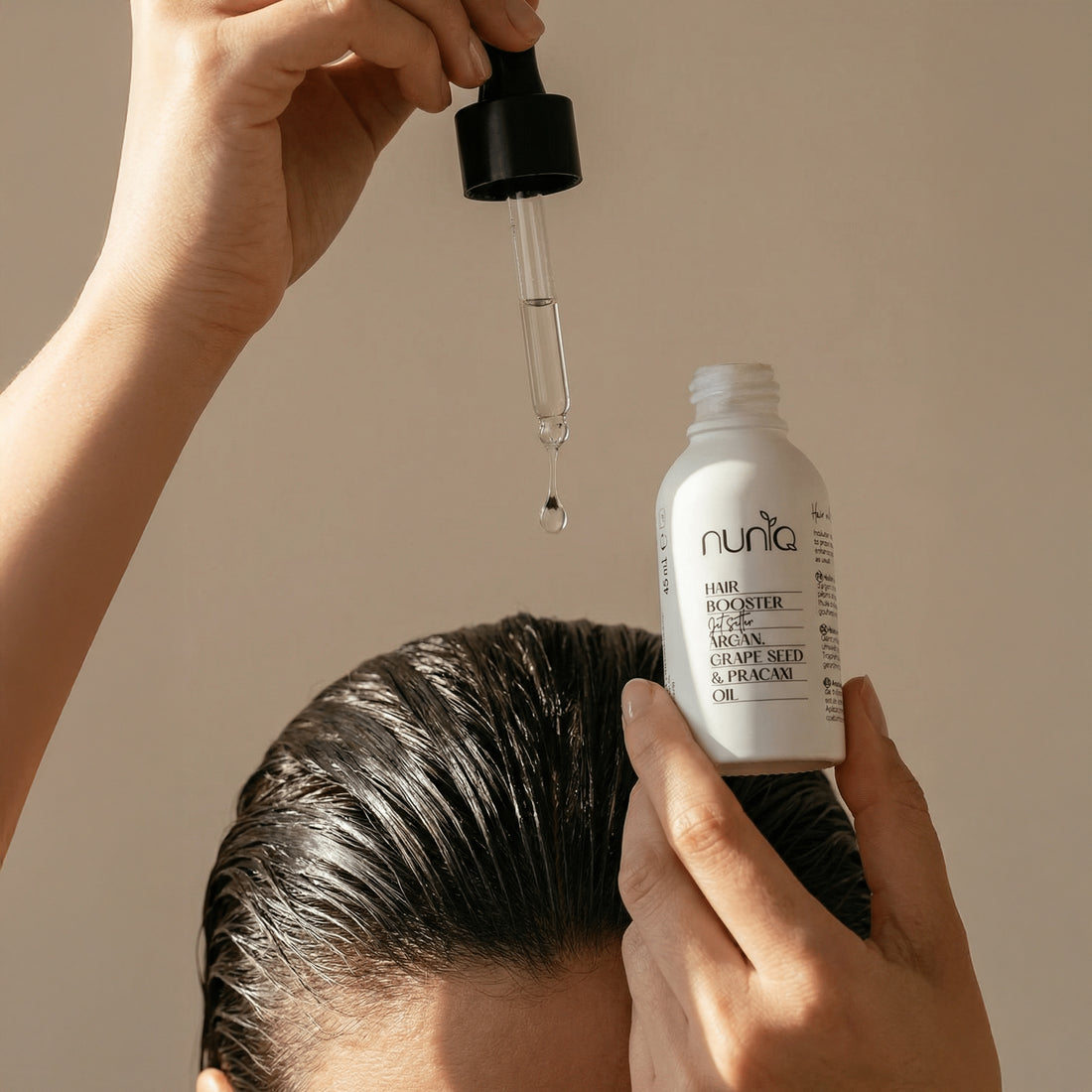 woman apply hair booster