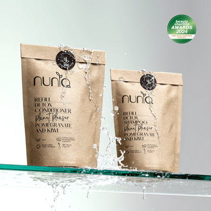 Two brown paper bags labeled &